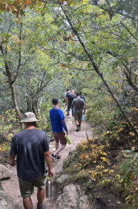 group therapy - men on hiking trail