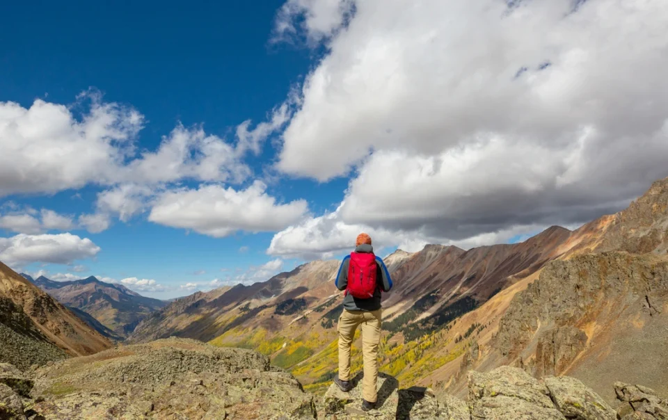 Understanding Colorado Dual Diagnosis Treatment Centers - man hiking in Colorado