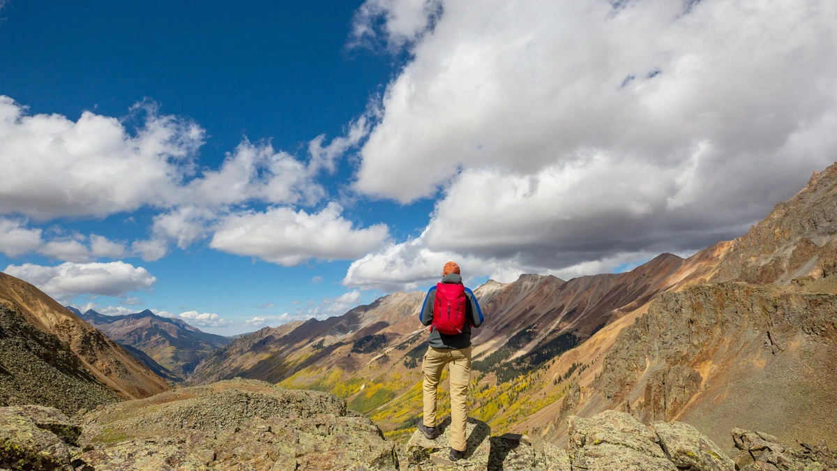 Understanding Colorado Dual Diagnosis Treatment Centers - man hiking in Colorado