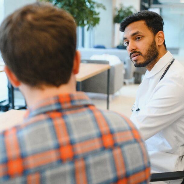 doctor seeing patients in office