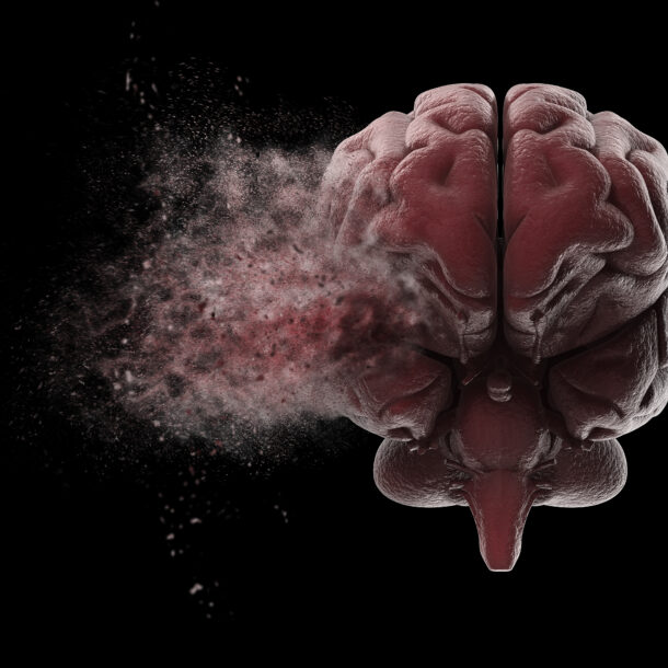 A disintegrating brain against a black background for the topic how does addiction affect the brain.